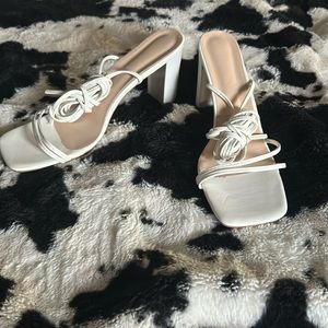 White strappy medium height heels